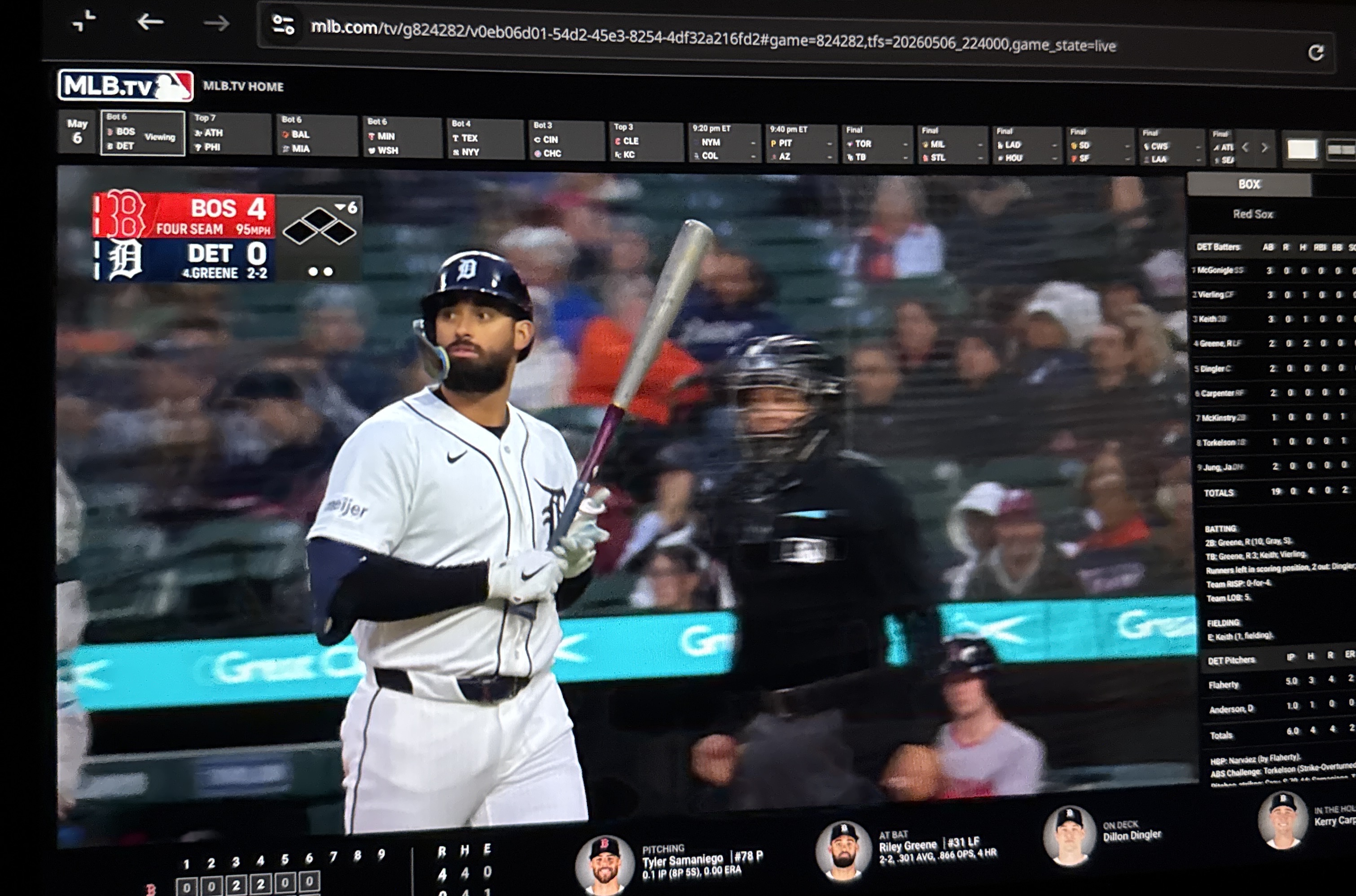 MLB.TV streaming a Red Sox game inside a Tesla at night